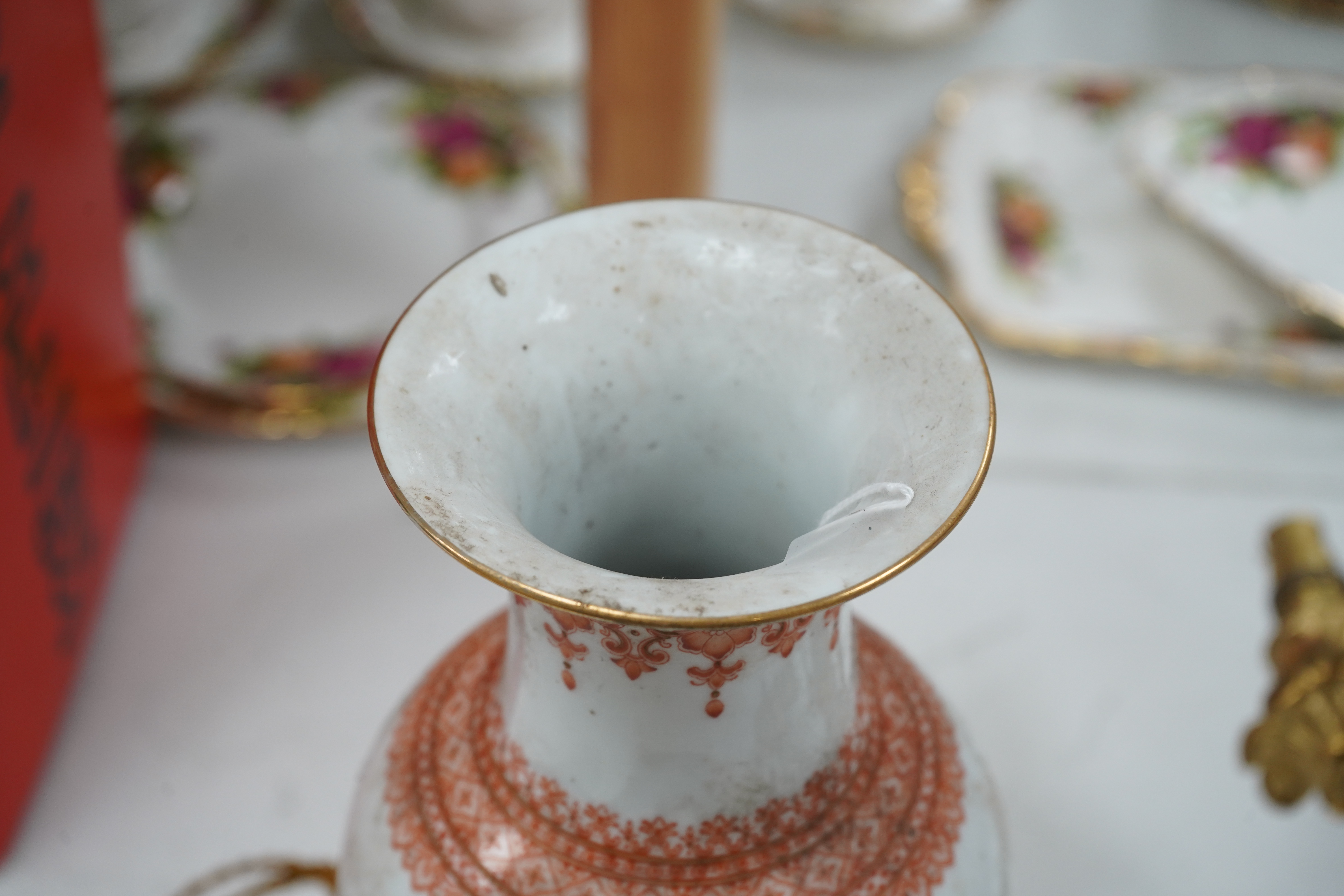 A Chinese 'mountain landscape' vase and a yellow ground tea caddy converted to a lamp, tallest 31cm. Condition - fair, would benefit from a clean